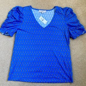 Brand new with tags loft shirt with ruffled sleeves. Size large.